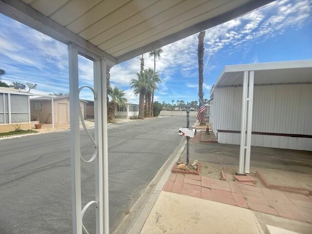 51555 Monroe Street Indio, CA 92201 - Photo 28 of 30 a view of a porch