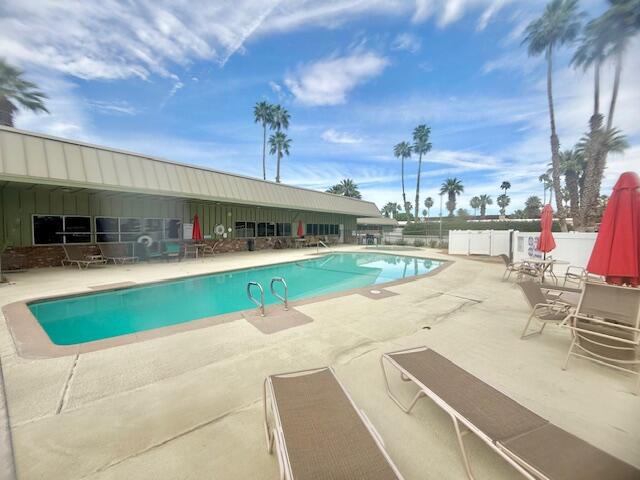 51555 Monroe Street Indio, CA 92201 - Photo 30 of 30 a view of a swimming pool with an outdoor seating