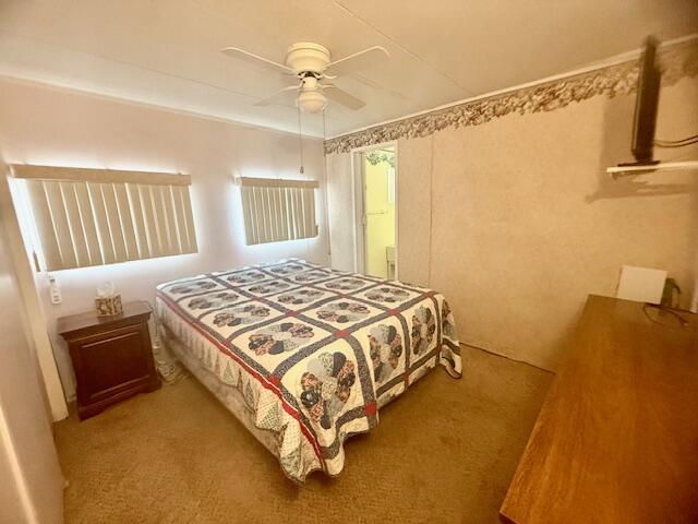 51555 Monroe Street Indio, CA 92201 - Photo 6 of 30 a bedroom with a bed and a dresser