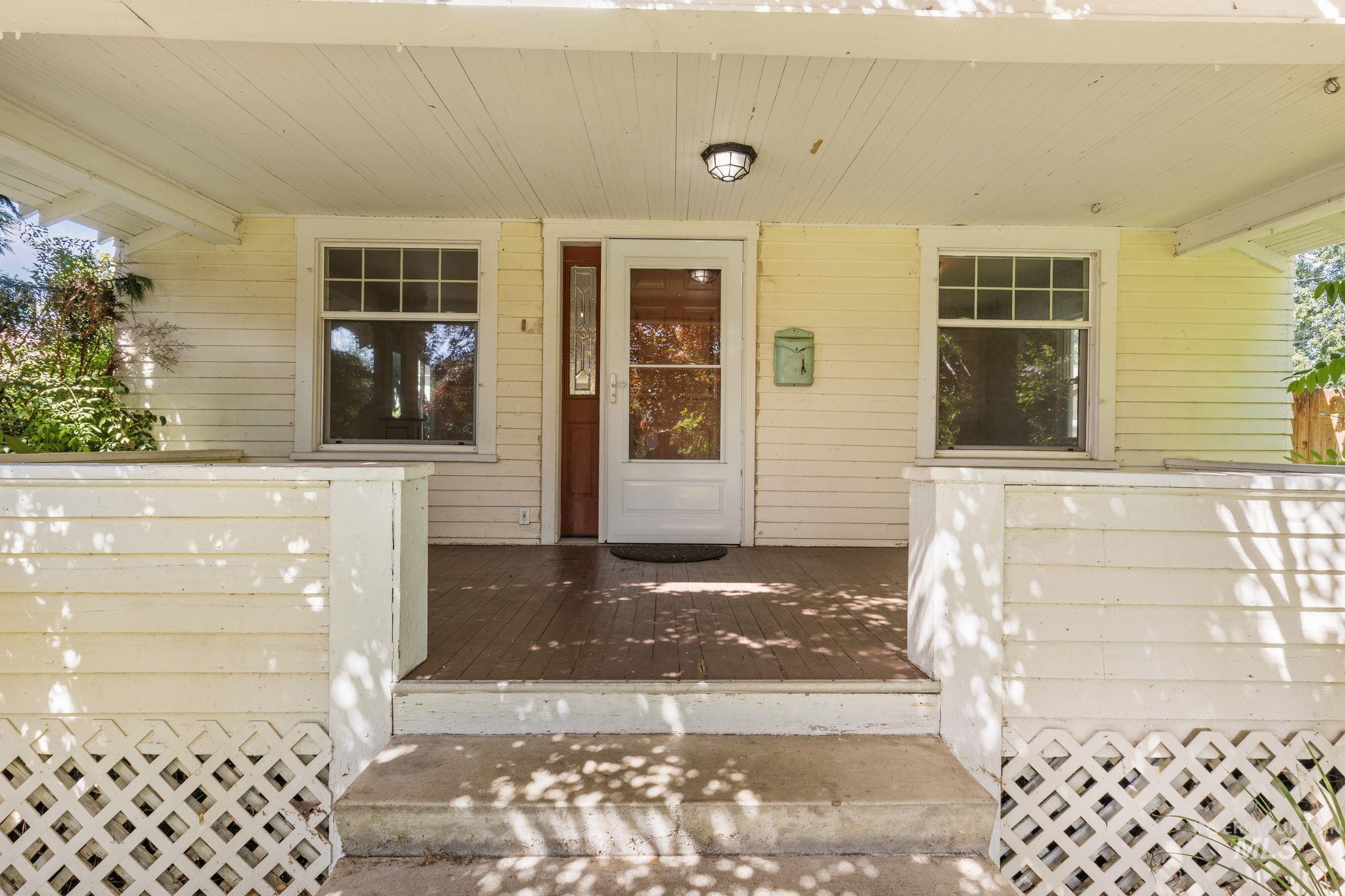 928 3rd Street Clarkston, WA 99403 - Photo 3 of 44 Covered front porch featuring wood-finish flooring and a beadboard ceiling