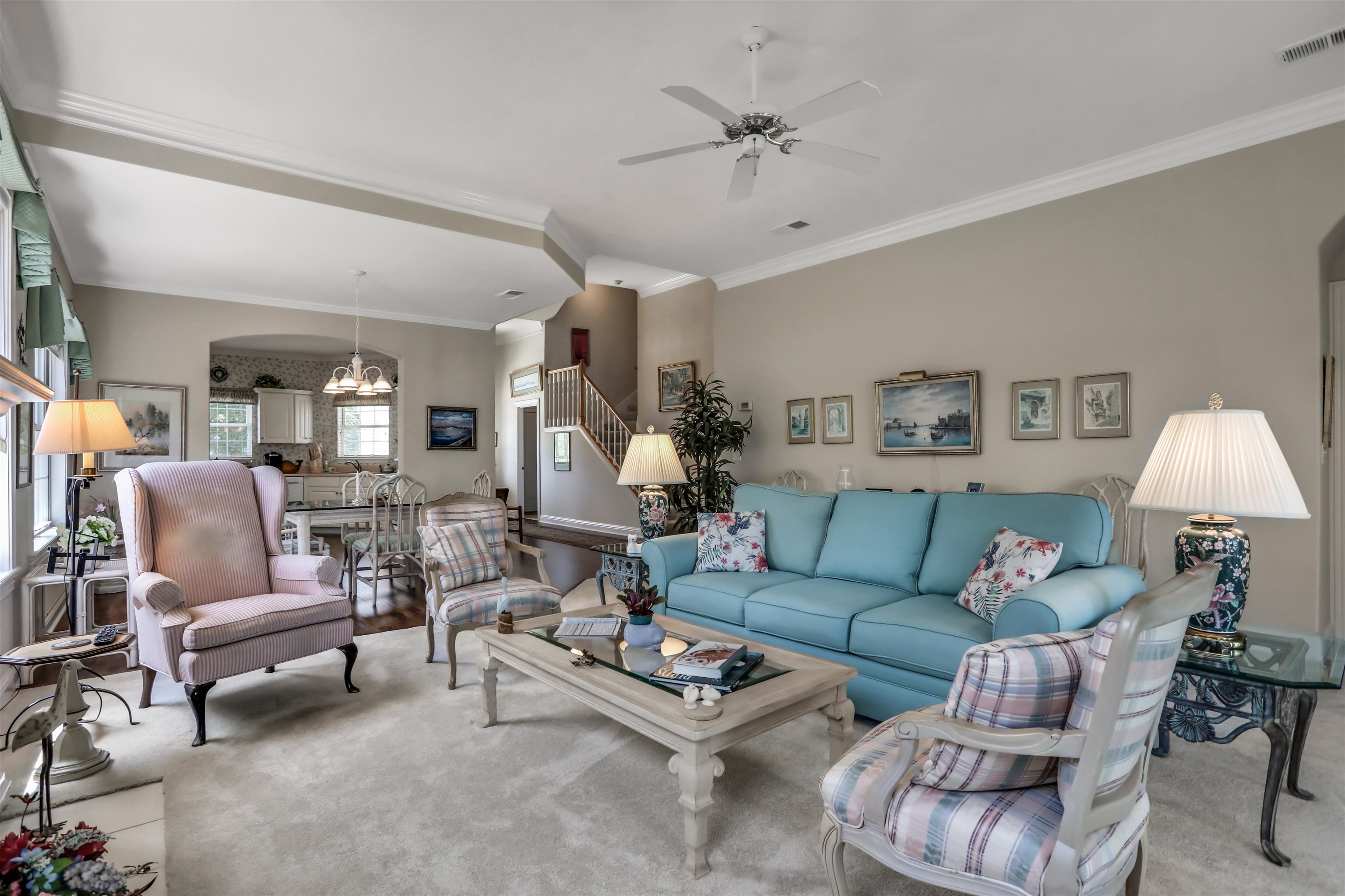 904 Birdie Way St. Augustine, FL 32080 - Photo 13 of 21 a living room with furniture and a chandelier