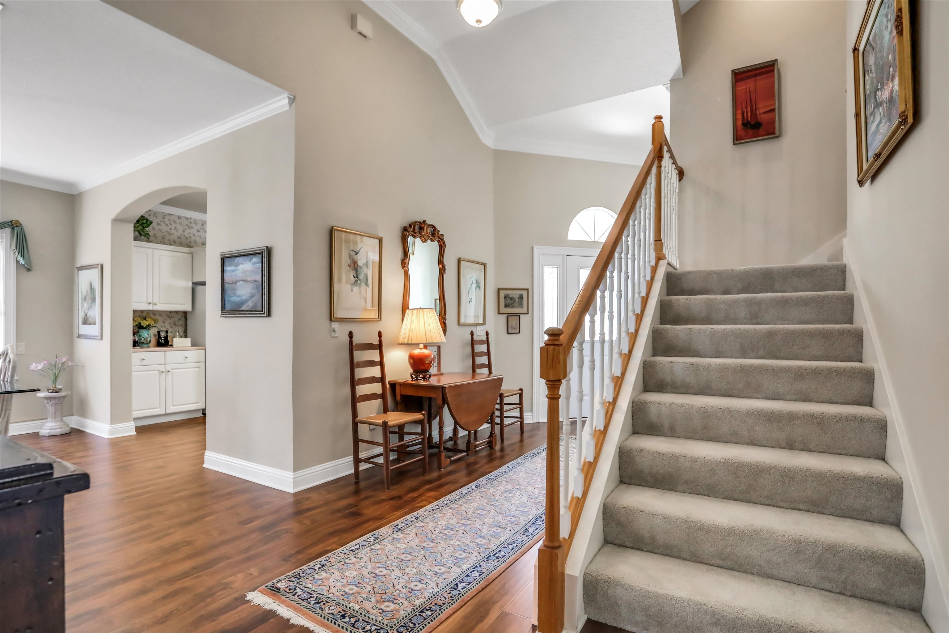 904 Birdie Way St. Augustine, FL 32080 - Photo 14 of 21 a view of entryway and hall with wooden floor