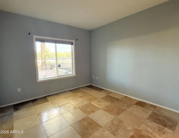 an empty room with a natural light