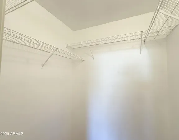 a bathroom with a toilet and a bathtub