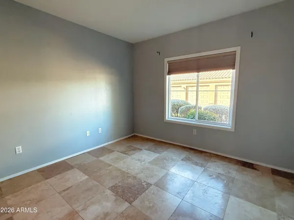 a view of a big room with closet and wooden floor