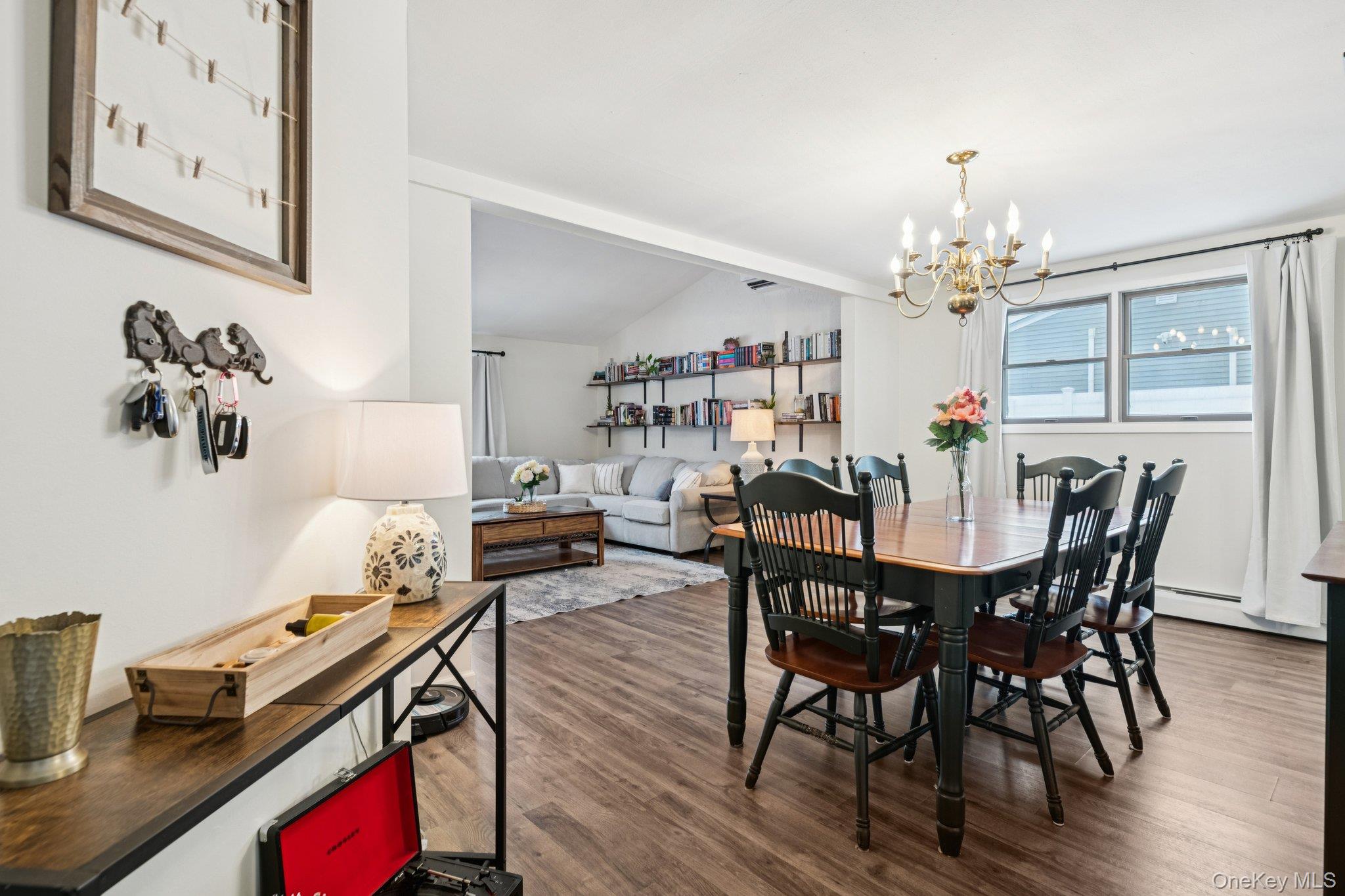 25 Wilson Street Centereach, NY 11720 - Photo 8 of 27 a view of a dining room with furniture and wooden floor