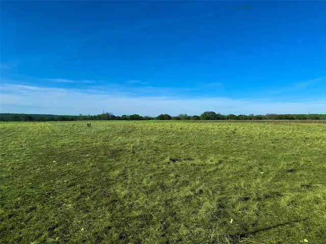 a view of a lake with a city