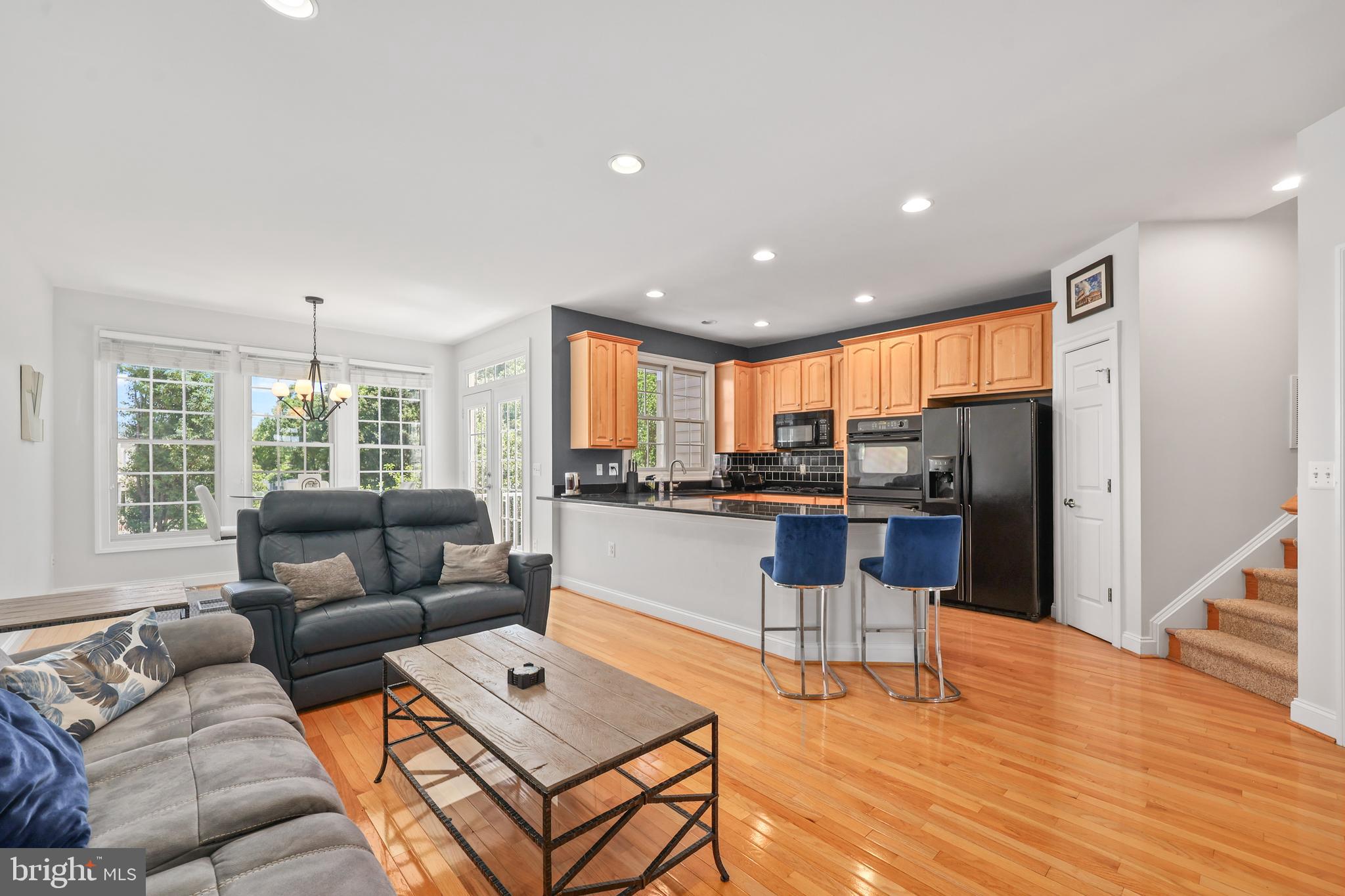 6806 Witton Circle Gainesville, VA 20155 - Photo 6 of 47 a living room with furniture and a large window