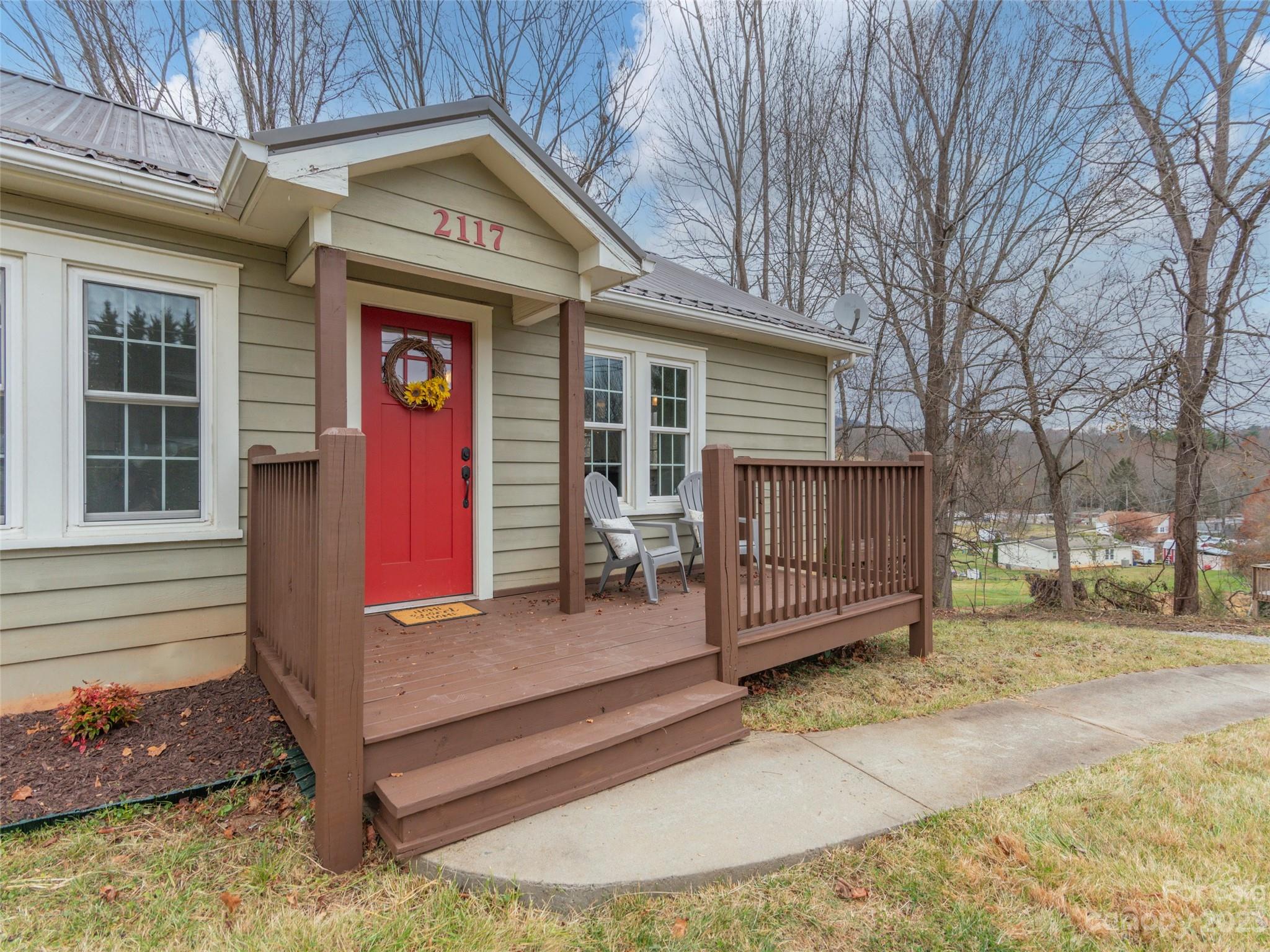 2117 Old Clyde Road Clyde, NC 28721 - Photo 19 of 24 a view of a house with a yard