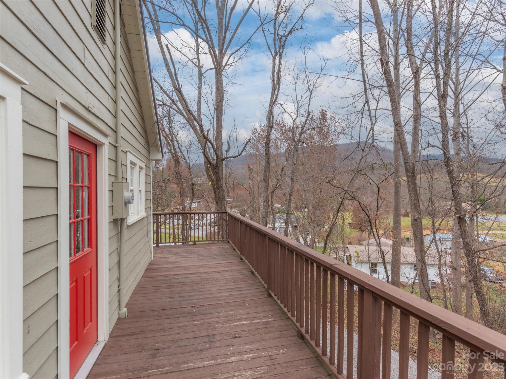 2117 Old Clyde Road Clyde, NC 28721 - Photo 20 of 24 a view of a house with a balcony