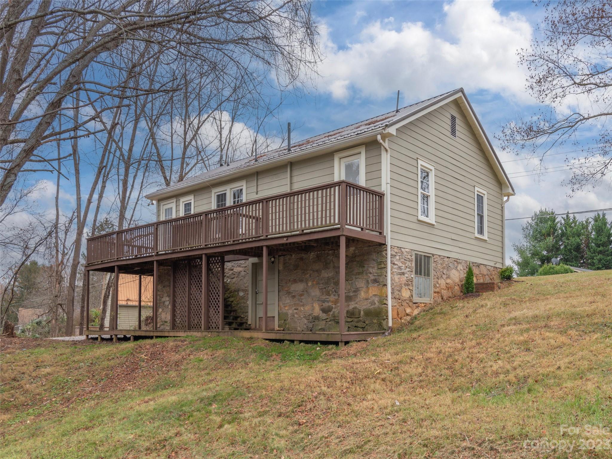 2117 Old Clyde Road Clyde, NC 28721 - Photo 22 of 24 a view of backyard of house