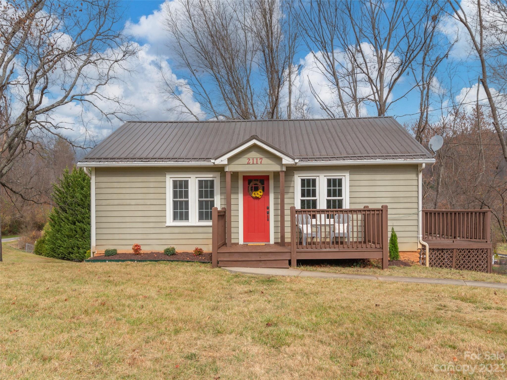 2117 Old Clyde Road Clyde, NC 28721 - Photo 24 of 24 a front view of a house with a yard