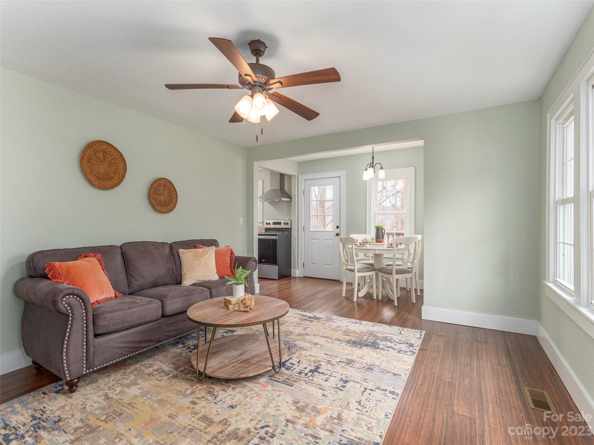 2117 Old Clyde Road Clyde, NC 28721 - Photo 7 of 24 a living room with furniture and wooden floor