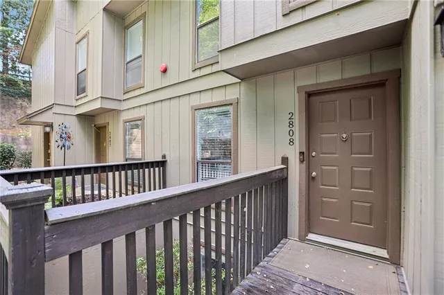 a view of a balcony with door