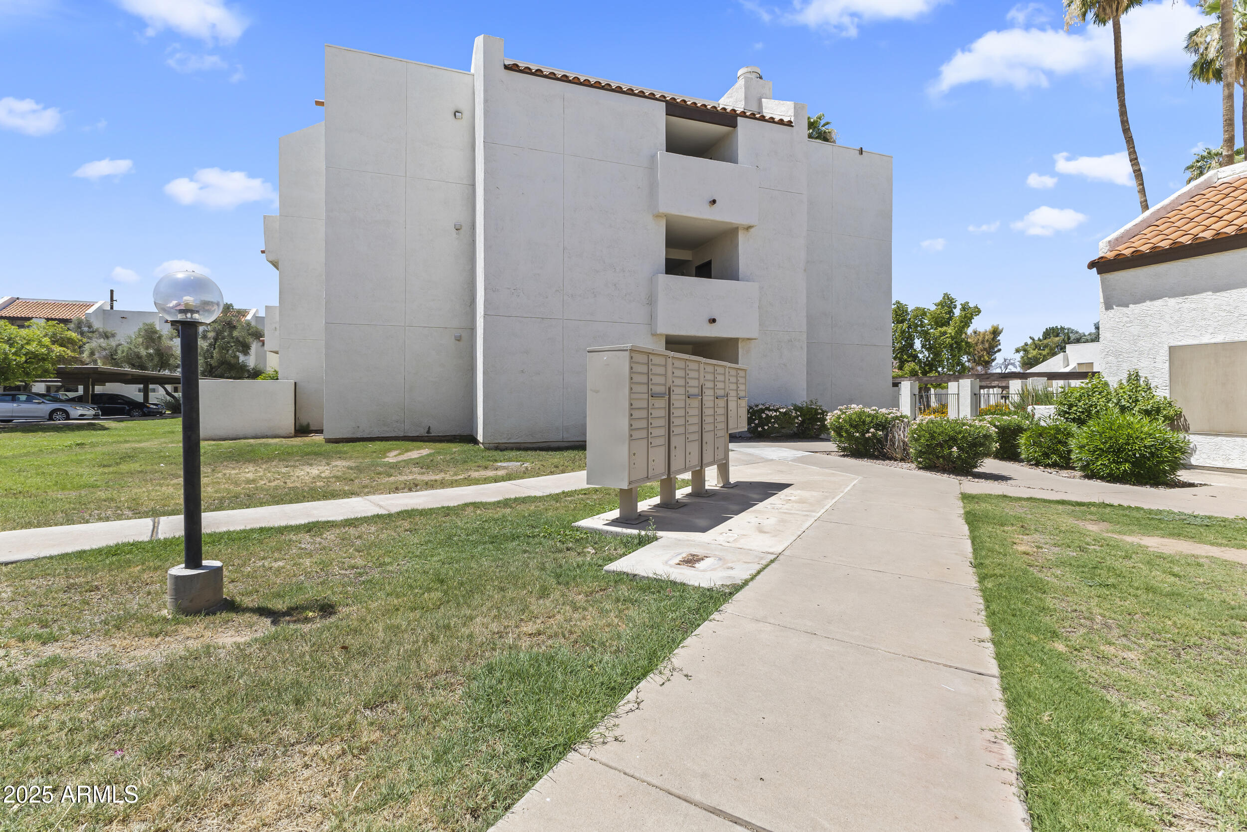 4730 West Northern Avenue, Unit 1158 Glendale, AZ 85301 - Photo 18 of 23 a view of a back yard of the house