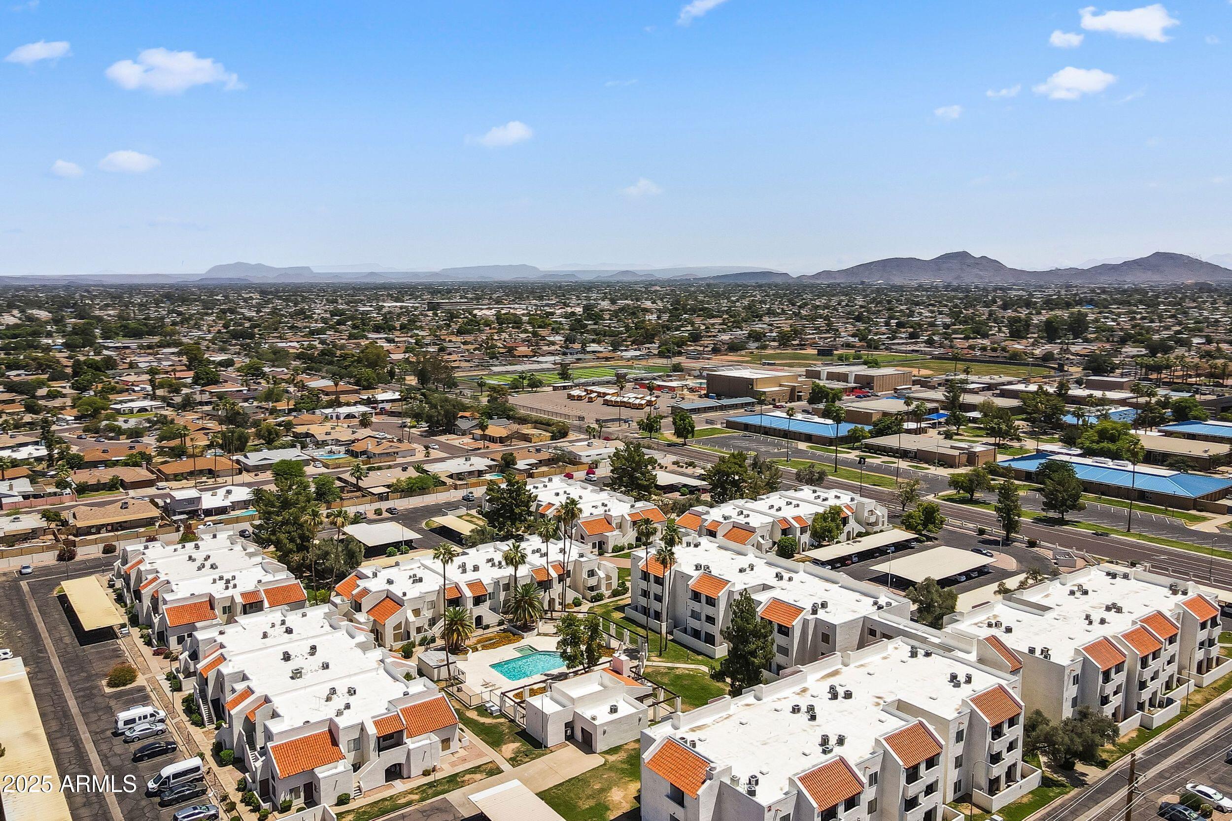 4730 West Northern Avenue, Unit 1158 Glendale, AZ 85301 - Photo 23 of 23 an aerial view of multiple house