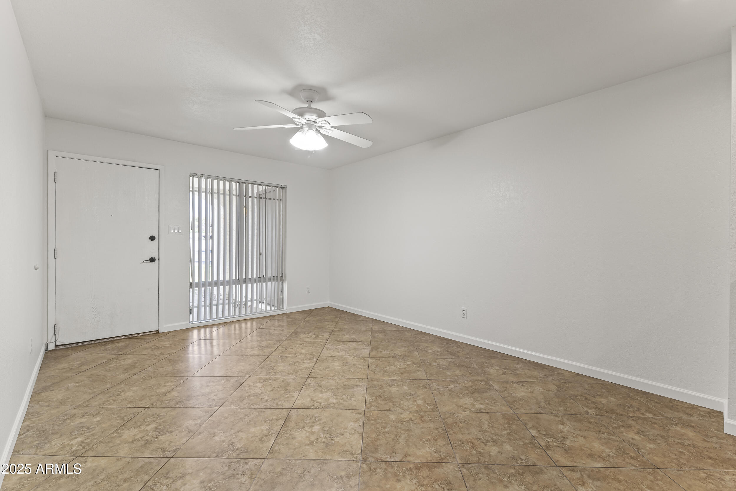 4730 West Northern Avenue, Unit 1158 Glendale, AZ 85301 - Photo 5 of 23 wooden floor in an empty room