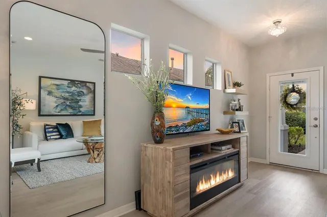 a kitchen with stainless steel appliances granite countertop a sink a stove top oven a counter space and cabinets