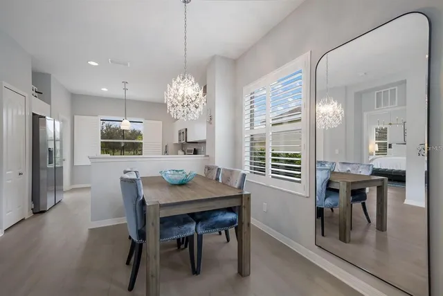 a view of a balcony with chair and table