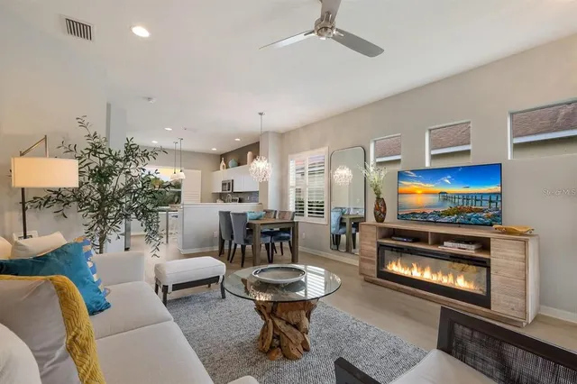 a view of a dining room with furniture and window