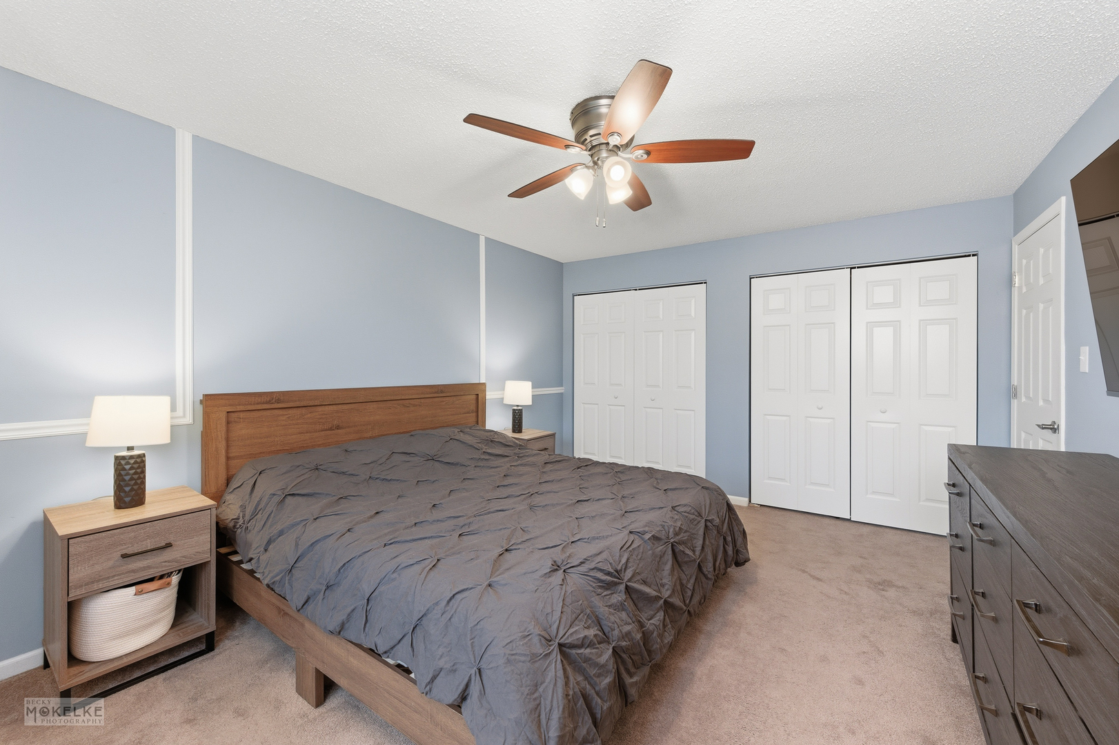 1000 South Raven Road Shorewood, IL 60404 - Photo 20 of 43 a bedroom with a bed and a chandelier