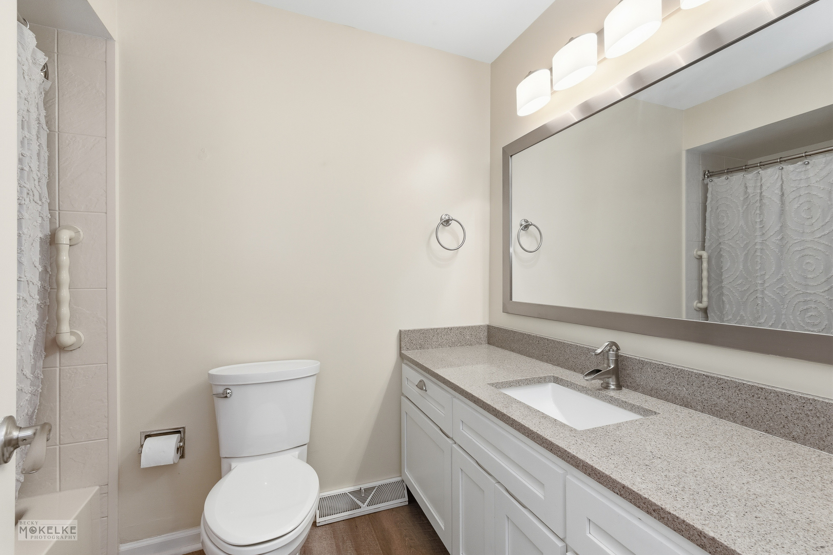 1000 South Raven Road Shorewood, IL 60404 - Photo 25 of 43 a bathroom with a granite countertop toilet sink and mirror