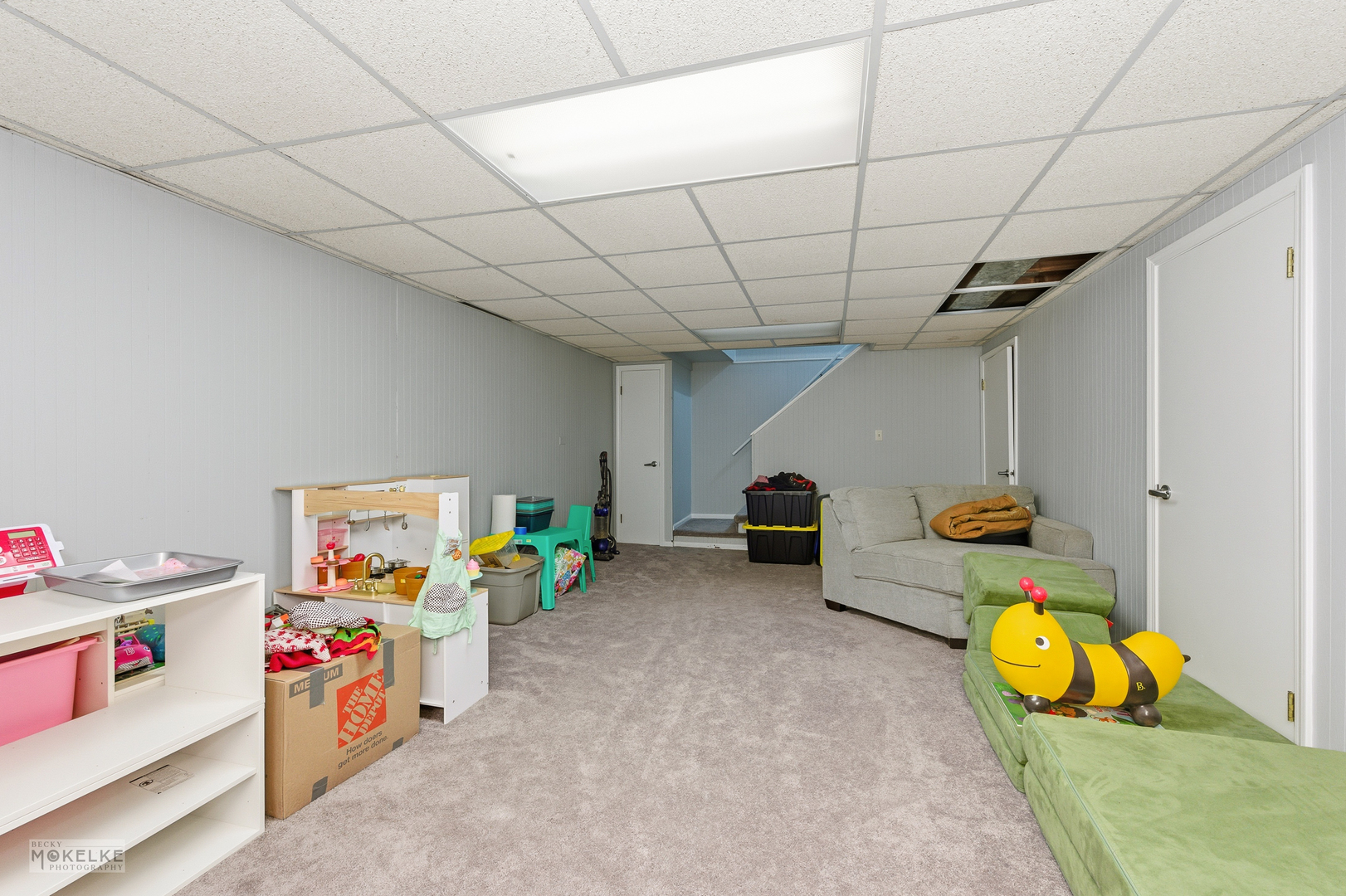 1000 South Raven Road Shorewood, IL 60404 - Photo 29 of 43 a storage room with furniture and toys