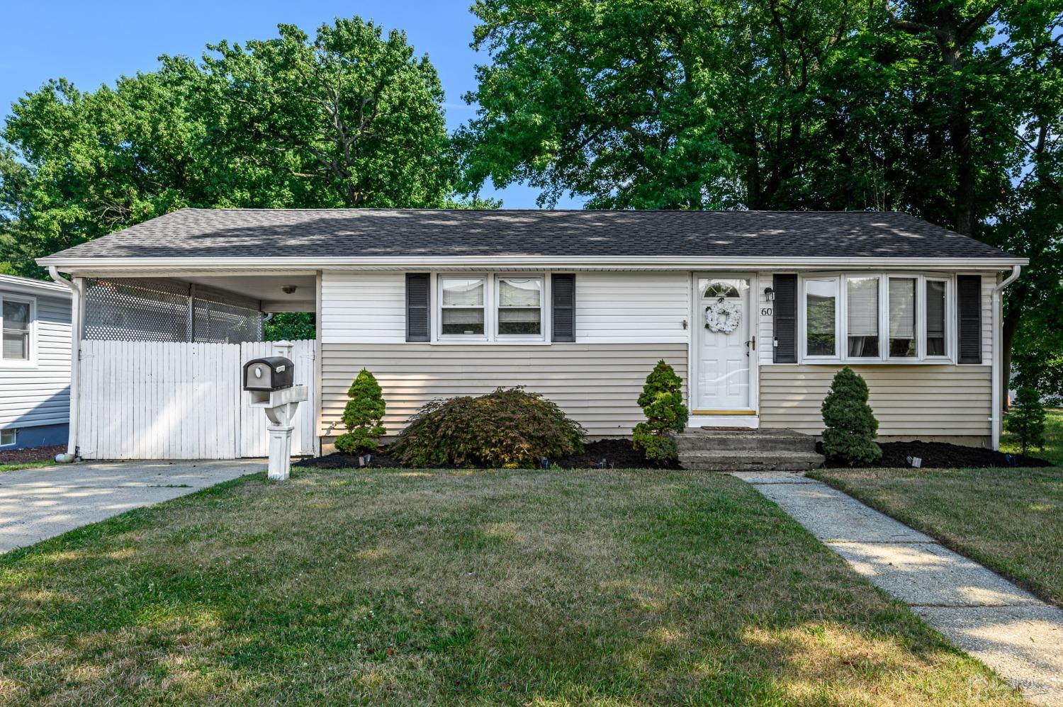 60 Ocean Boulevard Old Bridge, NJ 07735 - Photo 1 of 25 a front view of a house with a yard