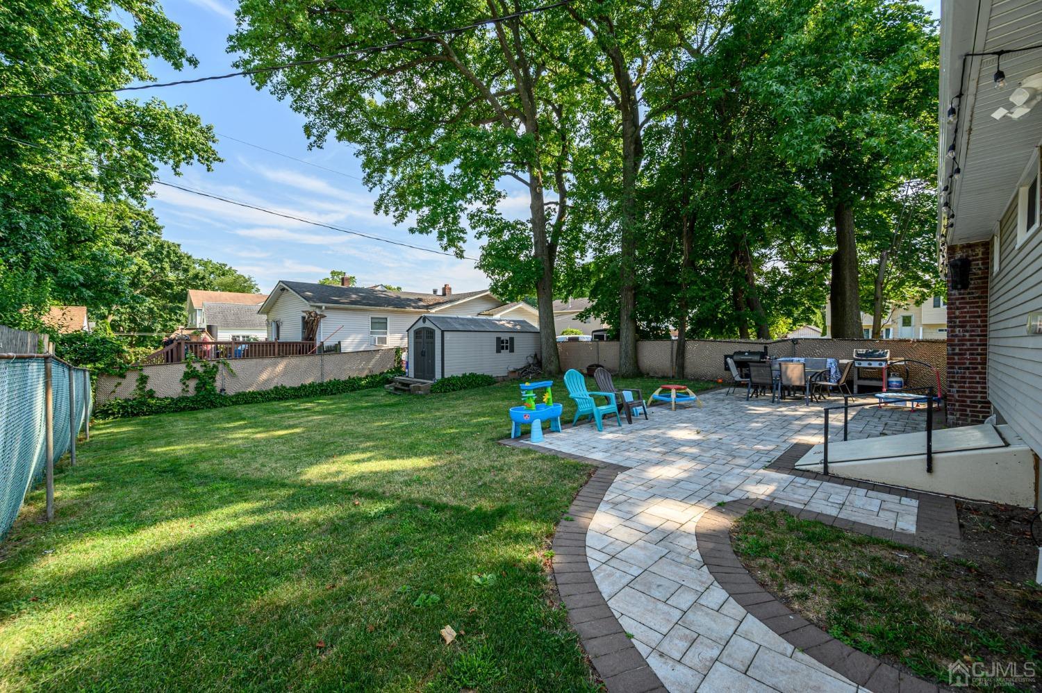 60 Ocean Boulevard Old Bridge, NJ 07735 - Photo 18 of 25 a front view of a house with garden
