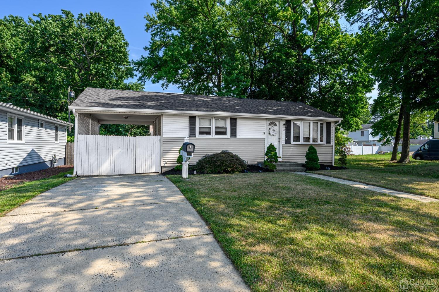 60 Ocean Boulevard Old Bridge, NJ 07735 - Photo 25 of 25 a front view of house with yard and green space