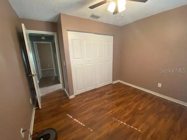 an empty room with a mirror