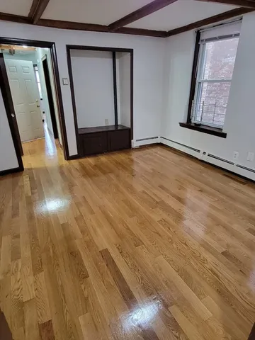 a view of an empty room and window