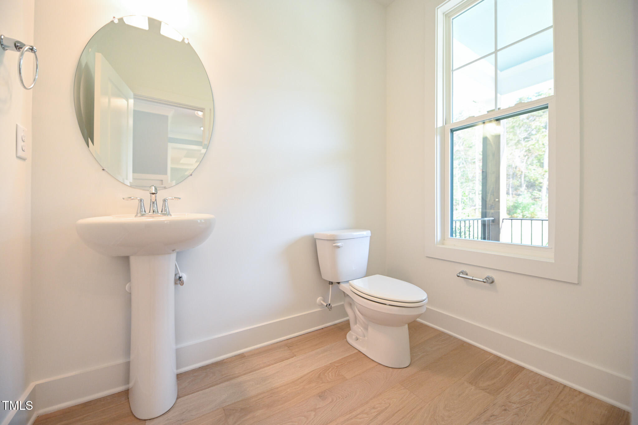 170 Sallyport Court Raleigh, NC 27603 - Photo 20 of 47 a bathroom with a sink toilet and a mirror