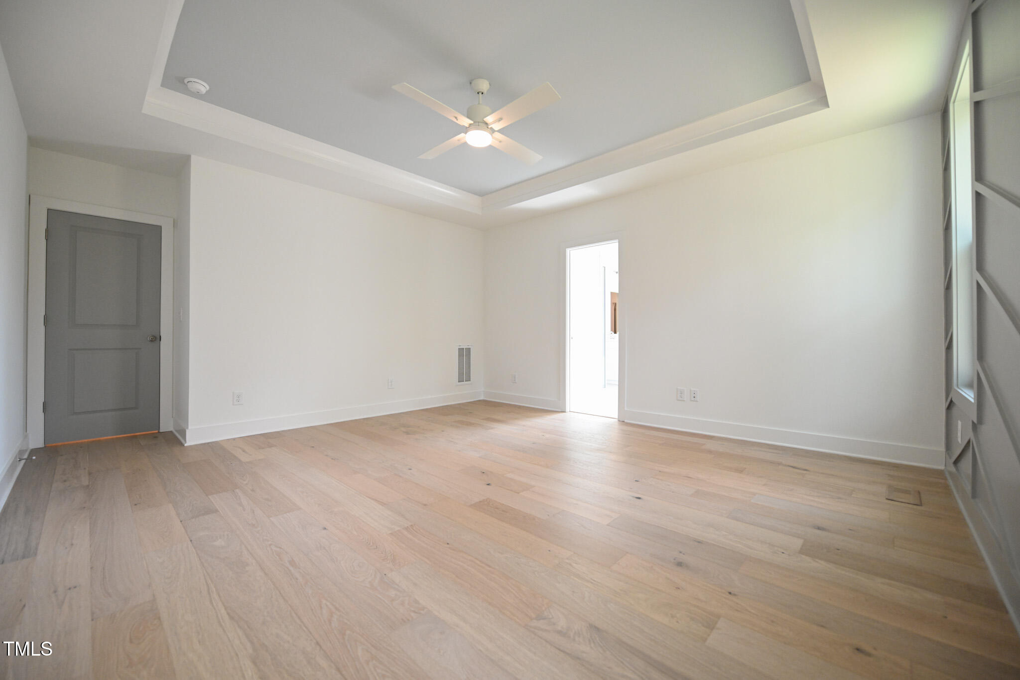 170 Sallyport Court Raleigh, NC 27603 - Photo 24 of 47 a view of an empty room with wooden floor