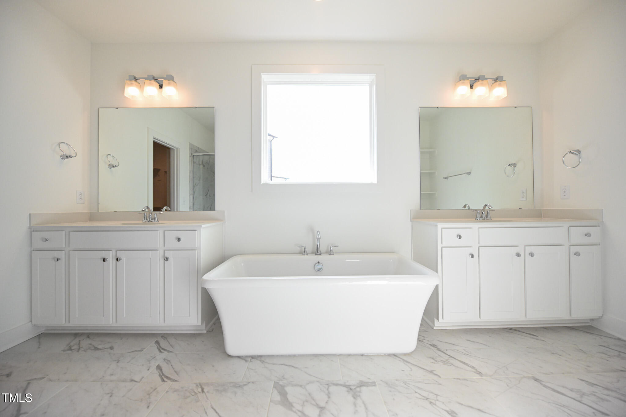 170 Sallyport Court Raleigh, NC 27603 - Photo 25 of 47 a spacious bathroom with a double vanity sink mirror and bathtub
