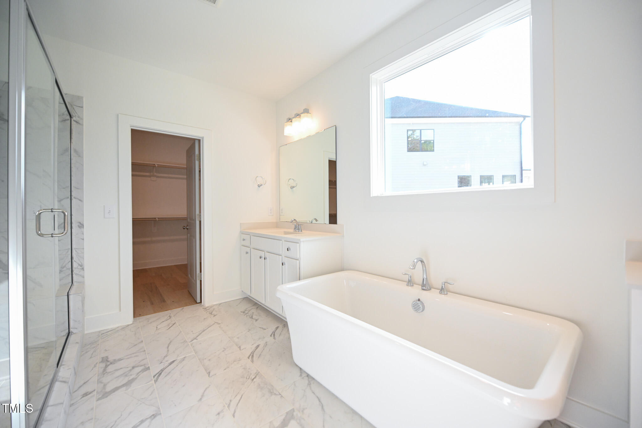 170 Sallyport Court Raleigh, NC 27603 - Photo 27 of 47 a bathroom with a bathtub and a sink