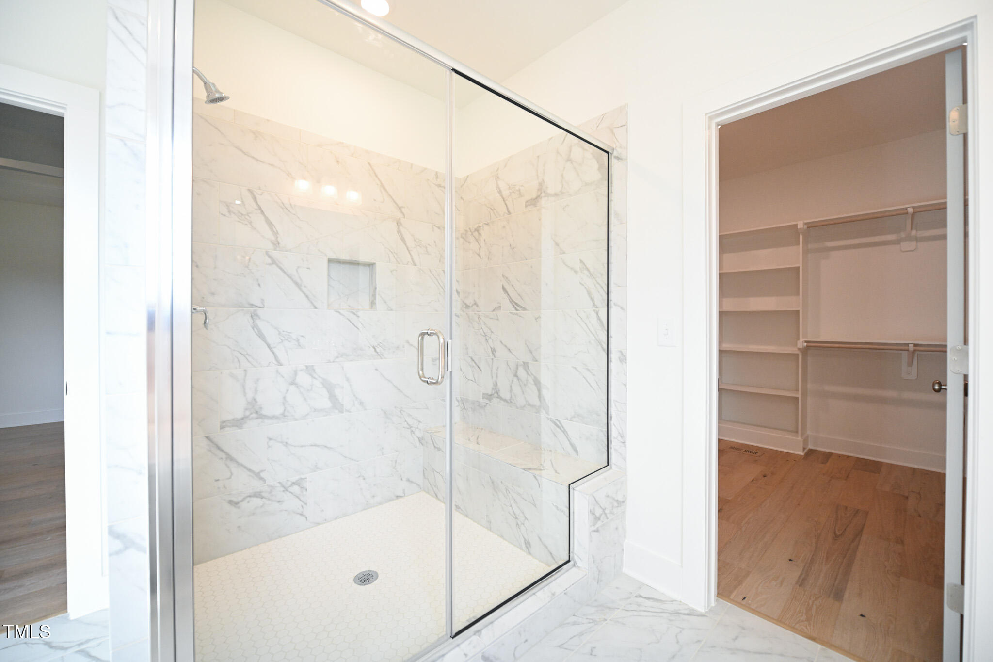 170 Sallyport Court Raleigh, NC 27603 - Photo 28 of 47 a bathroom with a glass shower door