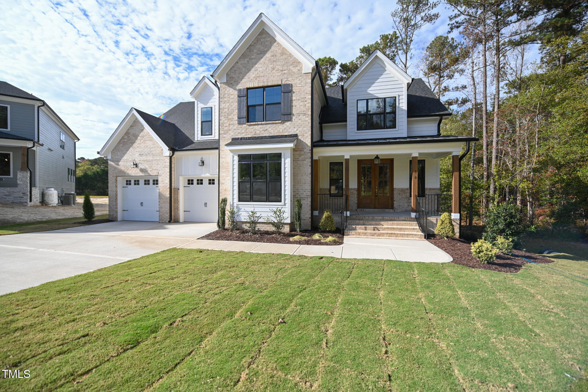 170 Sallyport Court Raleigh, NC 27603 - Photo 3 of 47 a front view of a house with yard and green space