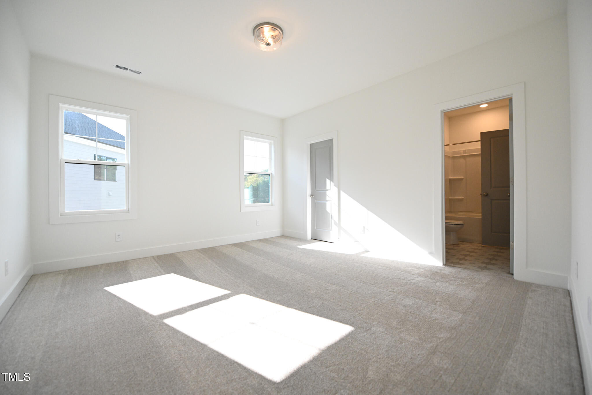 170 Sallyport Court Raleigh, NC 27603 - Photo 32 of 47 an empty room with windows