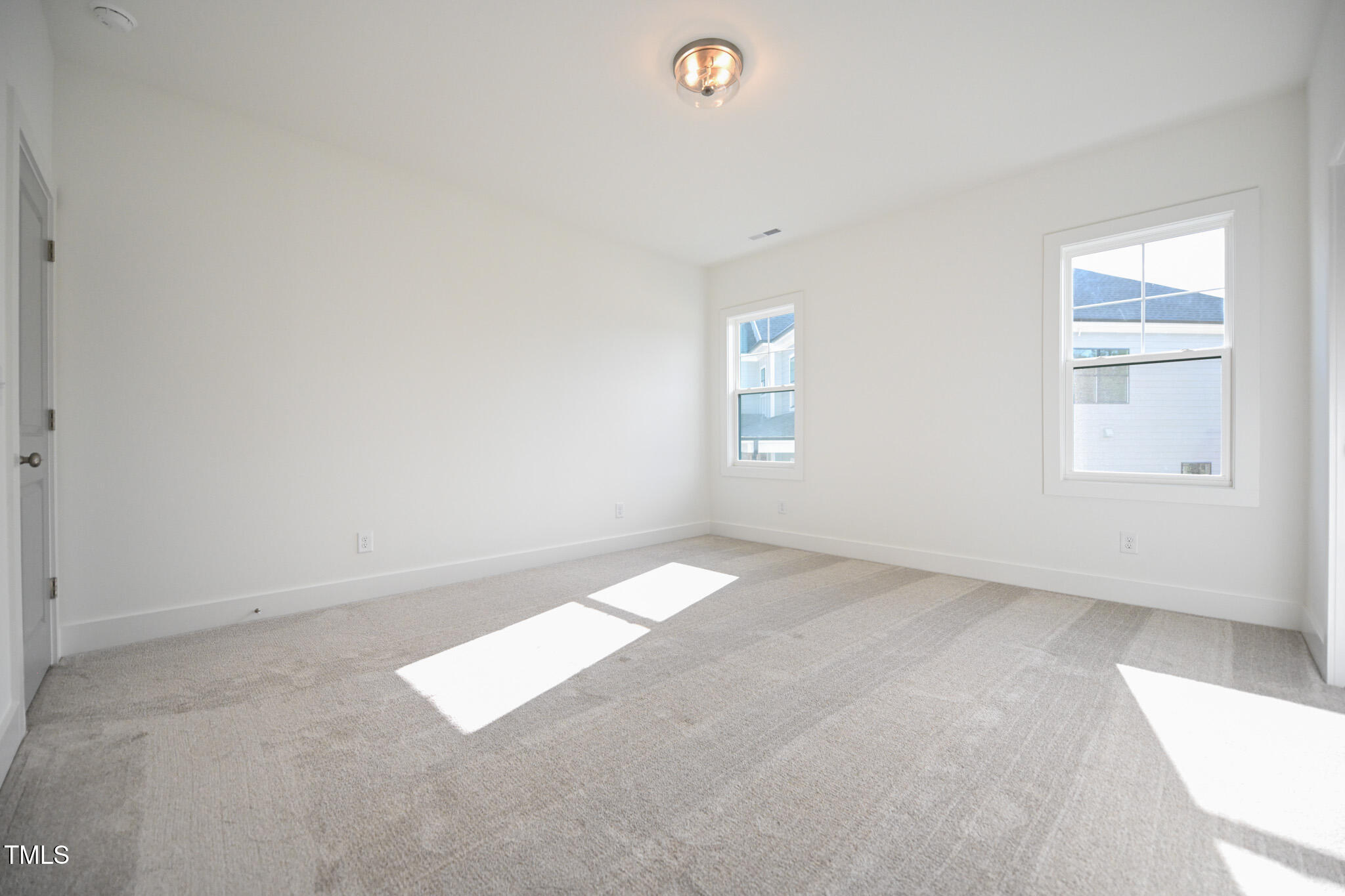 170 Sallyport Court Raleigh, NC 27603 - Photo 33 of 47 an empty room with windows