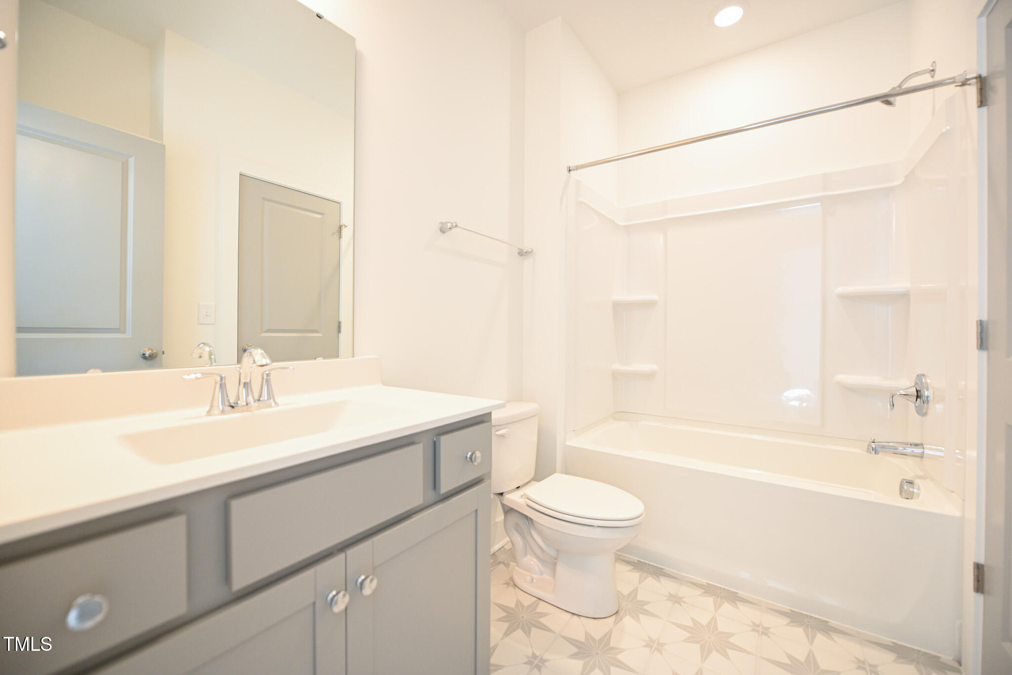 170 Sallyport Court Raleigh, NC 27603 - Photo 34 of 47 a bathroom with a sink a toilet and a bathtub