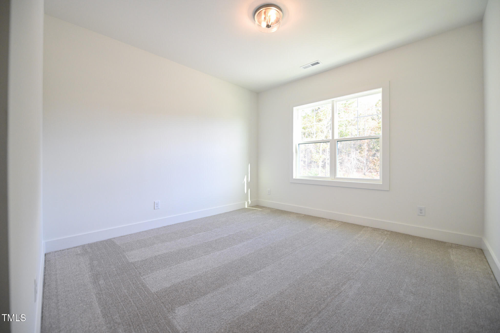 170 Sallyport Court Raleigh, NC 27603 - Photo 38 of 47 an empty room with a window