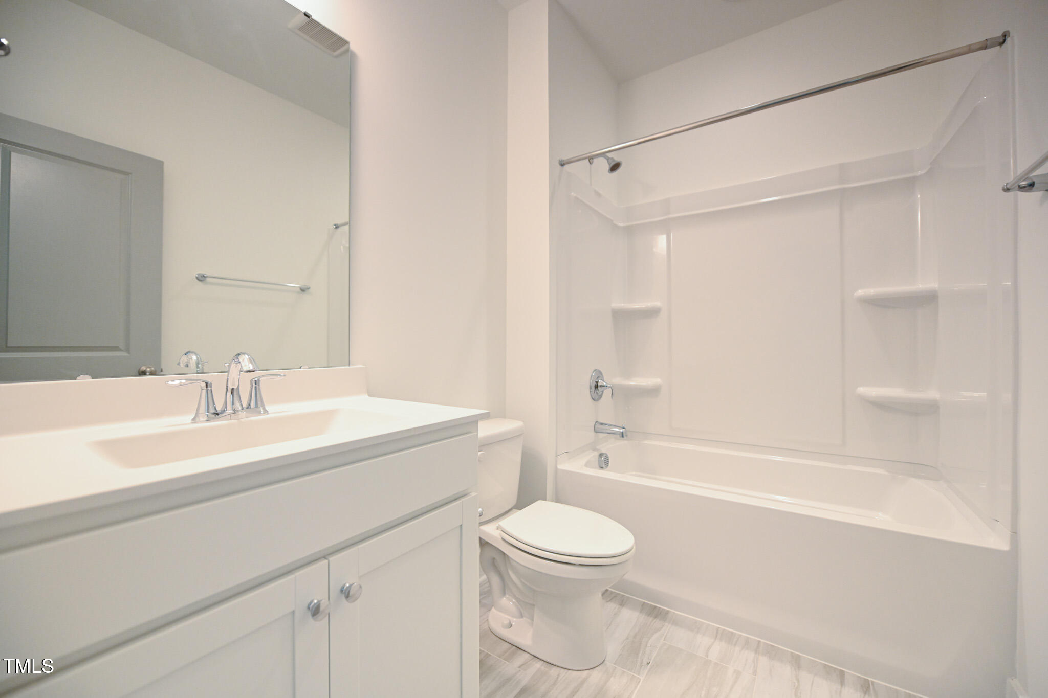 170 Sallyport Court Raleigh, NC 27603 - Photo 40 of 47 a bathroom with a sink a toilet and a bathtub