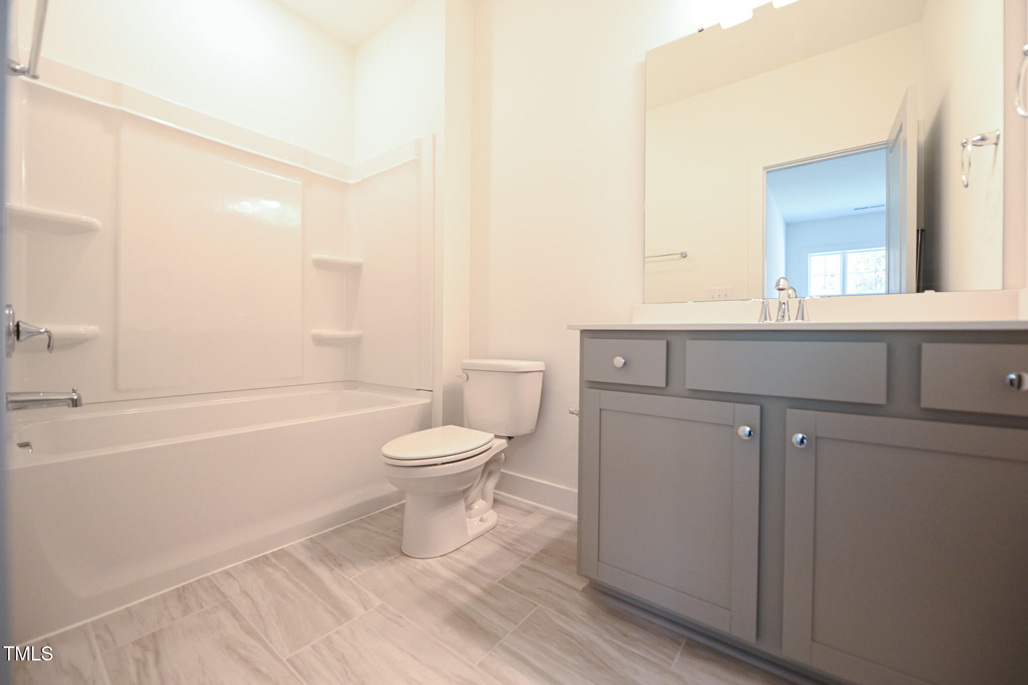 170 Sallyport Court Raleigh, NC 27603 - Photo 44 of 47 a bathroom with a sink a toilet and shower