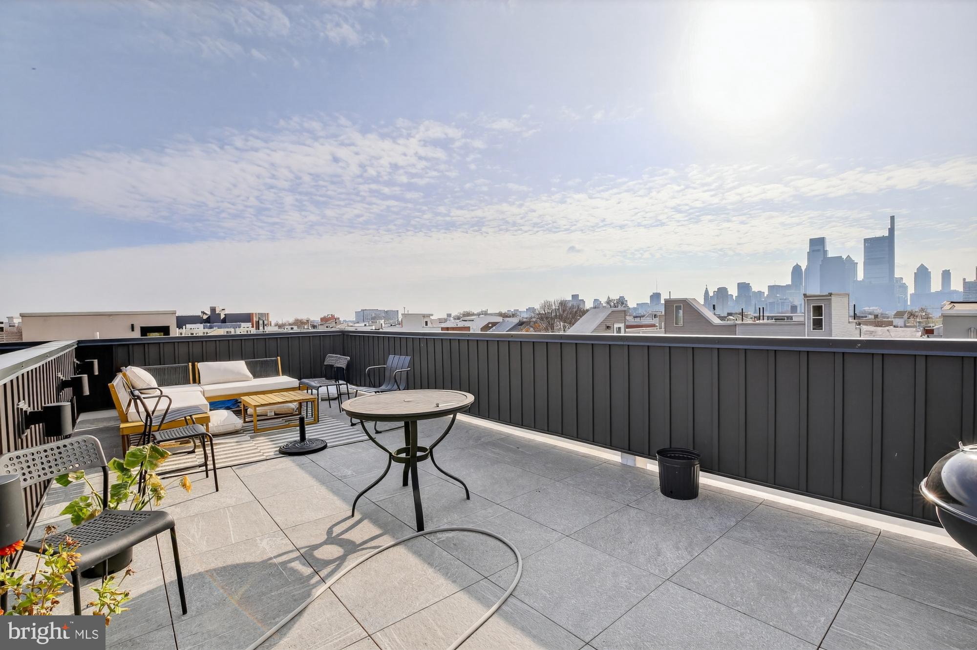 2007 Cambridge Street, Unit 9 Philadelphia, PA 19130 - Photo 24 of 33 an outdoor sitting area with furniture and city view