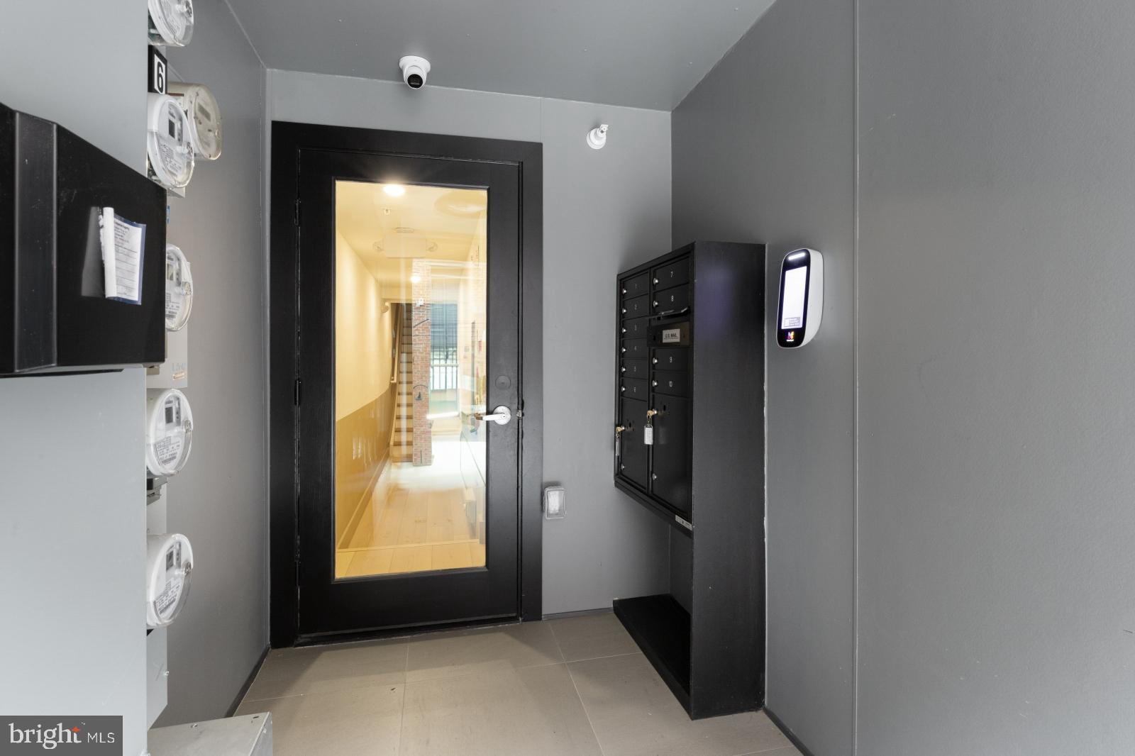 2007 Cambridge Street, Unit 9 Philadelphia, PA 19130 - Photo 28 of 33 a view of an empty room with a window