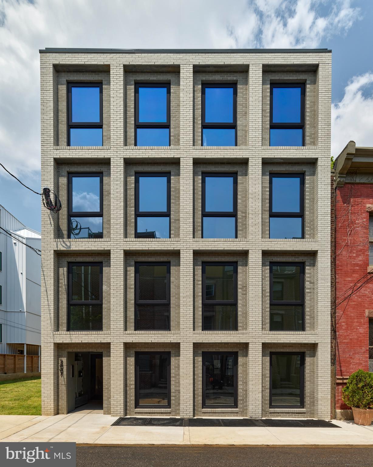 2007 Cambridge Street, Unit 9 Philadelphia, PA 19130 - Photo 32 of 33 a red brick building with windows