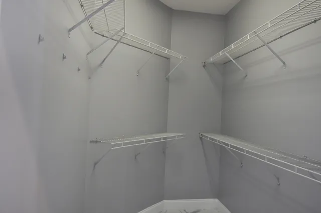 a view of a room with racks on the wall