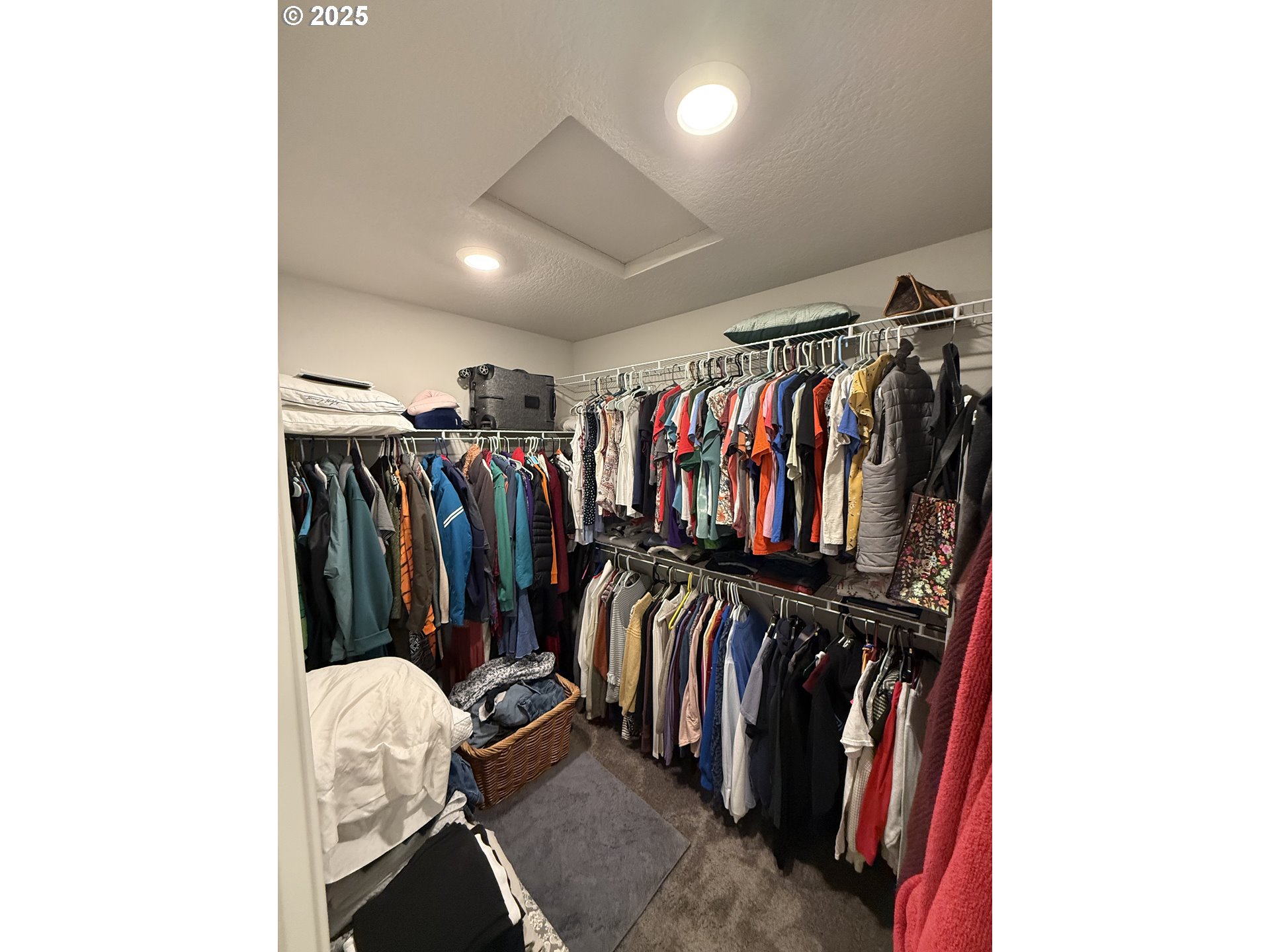 4135 South Canyon View Circle Ridgefield, WA 98642 - Photo 13 of 25 a view of walk in closet with clothes and shoes