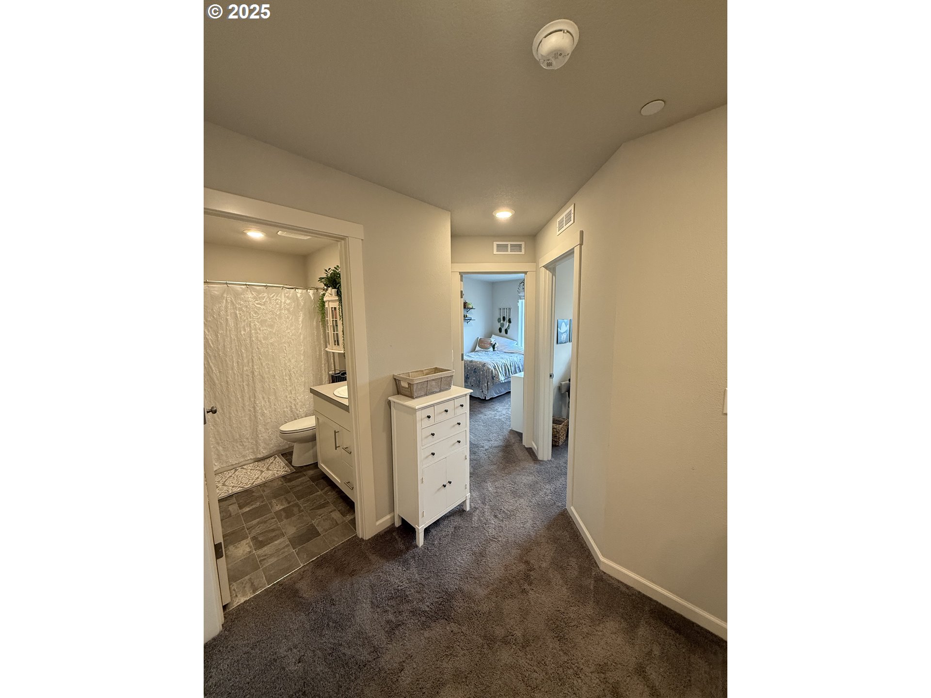 4135 South Canyon View Circle Ridgefield, WA 98642 - Photo 16 of 25 a view of a bathroom with a sink